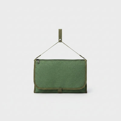 Tapis à langer nomade vert vue sur le produit