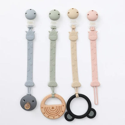 Attache tetine teintes pastelles assorties