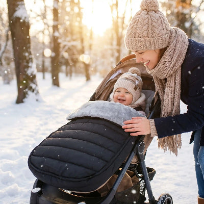 Chancelière poussette noire intérieur gris bébé hiver protection froid accessoire transport bébé