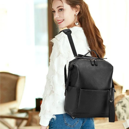 Sac à dos à langer noir multifonction en similicuir, utilisable au quotidien, avec grand compartiment zippé
