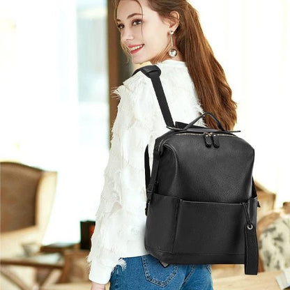 Sac à dos à langer noir multifonction en similicuir, utilisable au quotidien, avec grand compartiment zippé